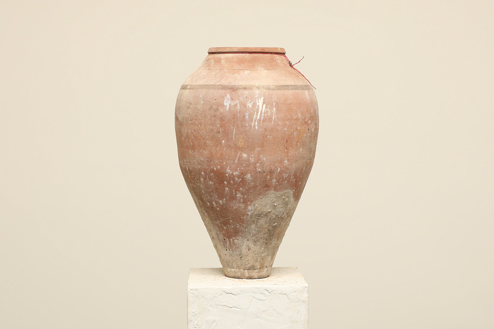 A one-of-a-kind neutral Turkish vintage vase pot without a handle, crafted from terra cotta clay, this piece showcases timeless quality and antique craftsmanship, adding a unique touch of history to your space