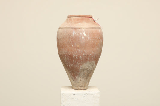 A one-of-a-kind neutral Turkish vintage vase pot without a handle, crafted from terra cotta clay, this piece showcases timeless quality and antique craftsmanship, adding a unique touch of history to your space