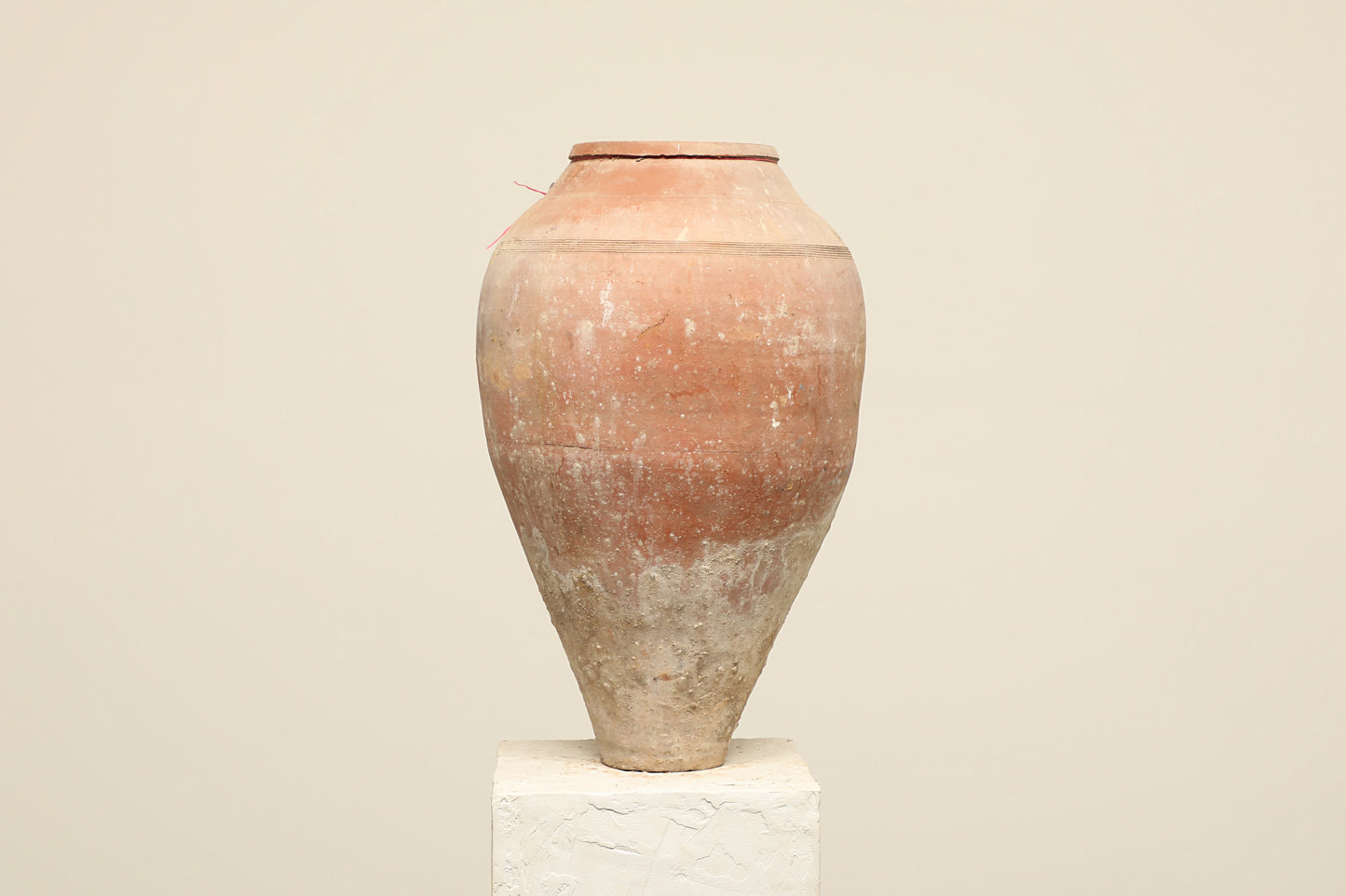 A one-of-a-kind neutral Turkish vintage vase pot without a handle, crafted from terra cotta clay, this piece showcases timeless quality and antique craftsmanship, adding a unique touch of history to your space