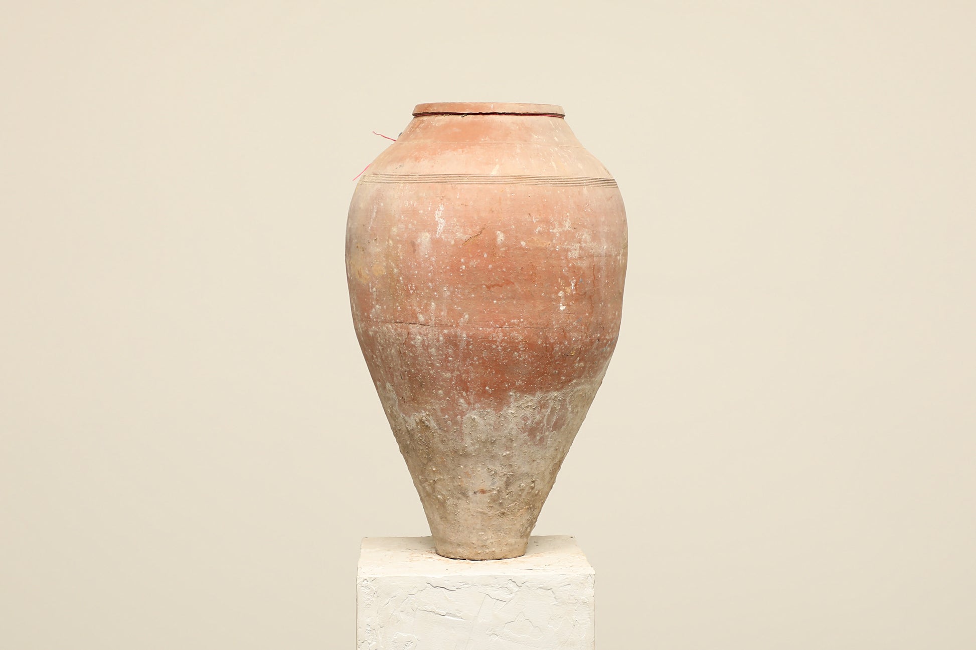 A one-of-a-kind neutral Turkish vintage vase pot without a handle, crafted from terra cotta clay, this piece showcases timeless quality and antique craftsmanship, adding a unique touch of history to your space