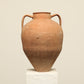A one-of-a-kind rustic red Turkish vintage vase pot with two handles, crafted from terra cotta clay, this piece showcases timeless quality and antique craftsmanship, adding a unique touch of history to your space