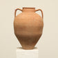 A one-of-a-kind rustic red Turkish vintage vase pot with two handles, crafted from terra cotta clay, this piece showcases timeless quality and antique craftsmanship, adding a unique touch of history to your space