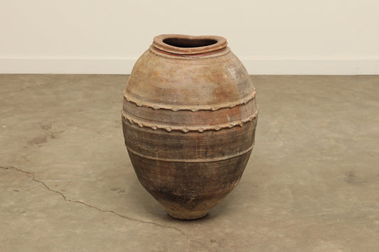 A one-of-a-kind dark brown Turkish vintage vase pot without a handle, crafted from terra cotta clay, this piece showcases timeless quality and antique craftsmanship, adding a unique touch of history to your space