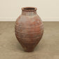 A one-of-a-kind dark brown Turkish vintage vase pot without a handle, crafted from terra cotta clay, this piece showcases timeless quality and antique craftsmanship, adding a unique touch of history to your space