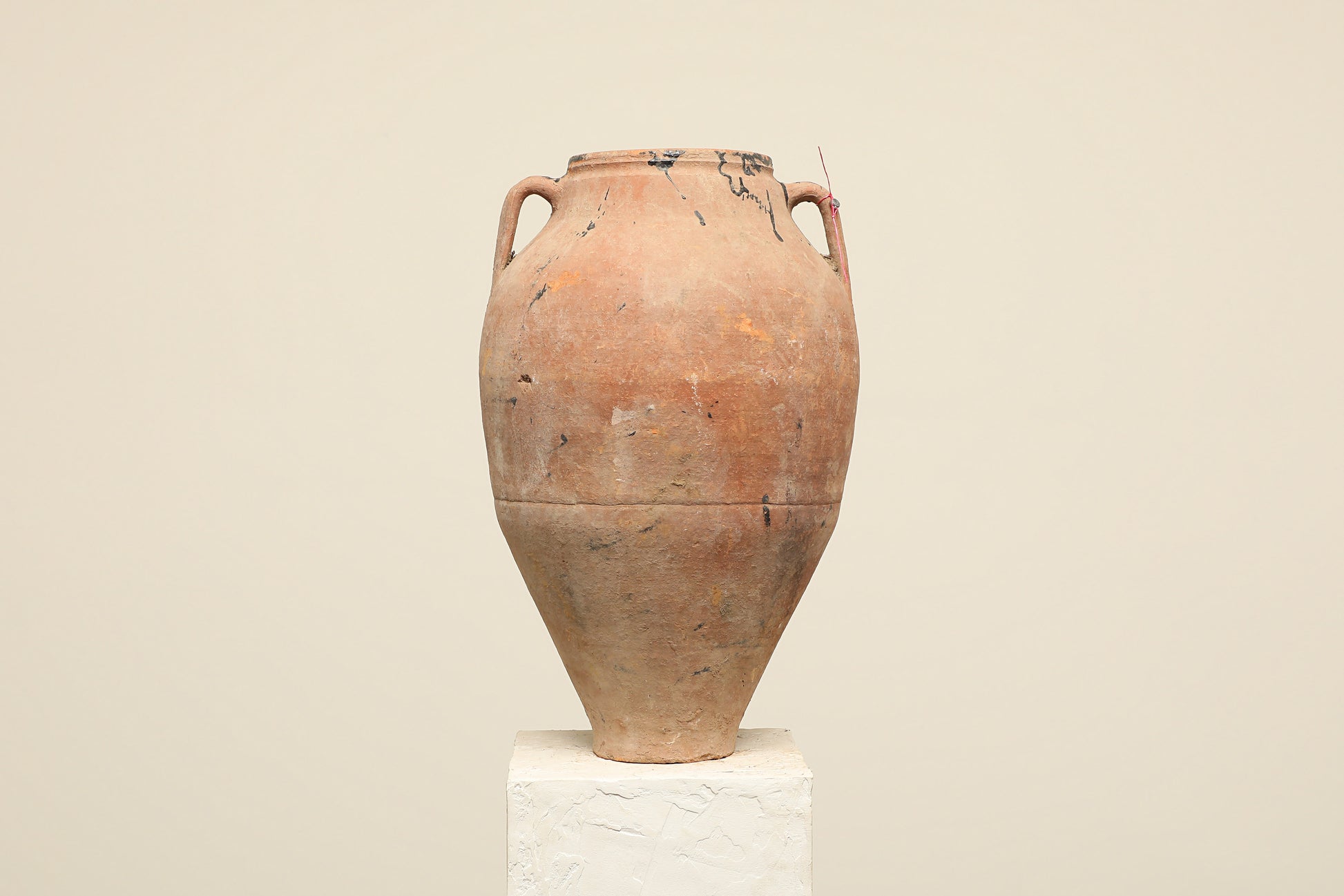 A one-of-a-kind clay brown Turkish vintage vase pot with two handles, crafted from terra cotta clay, this piece showcases timeless quality and antique craftsmanship, adding a unique touch of history to your space