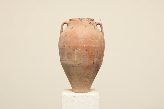 A one-of-a-kind clay brown Turkish vintage vase pot with two handles, crafted from terra cotta clay, this piece showcases timeless quality and antique craftsmanship, adding a unique touch of history to your space