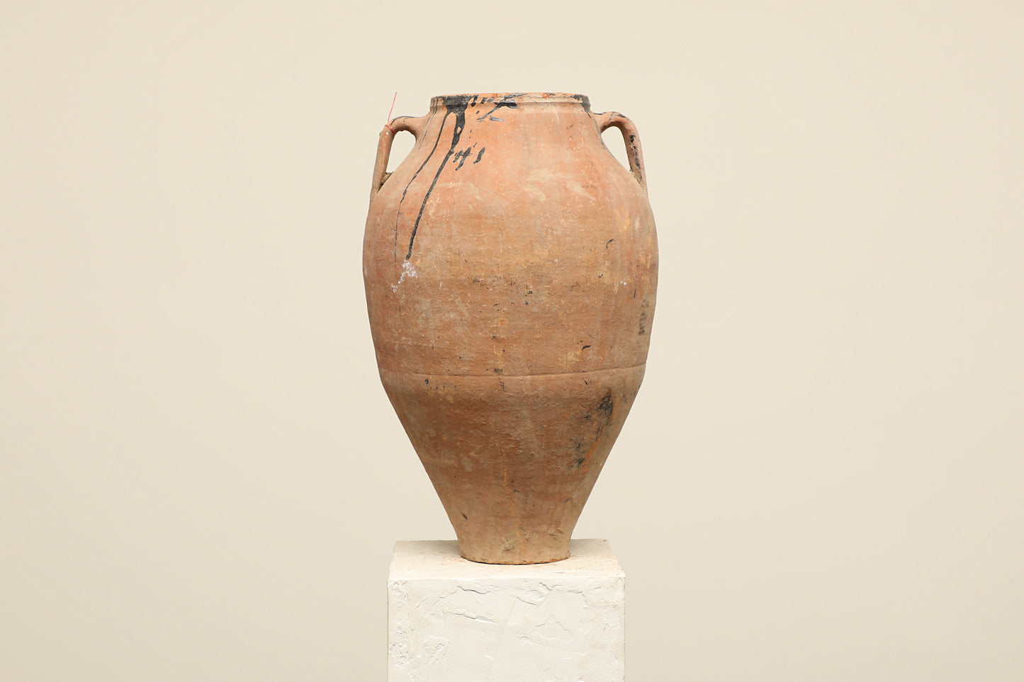 A one-of-a-kind clay brown Turkish vintage vase pot with two handles, crafted from terra cotta clay, this piece showcases timeless quality and antique craftsmanship, adding a unique touch of history to your space