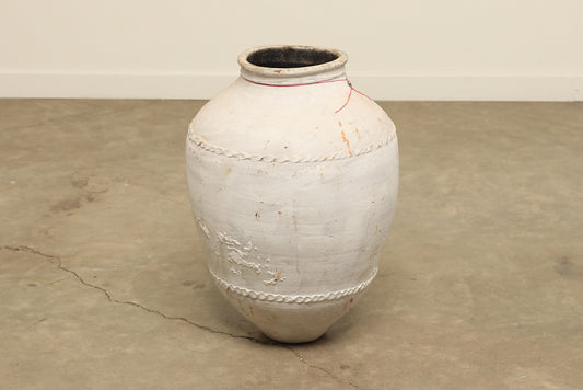 A one-of-a-kind white Turkish vintage vase pot without a handle, crafted from terra cotta clay, this piece showcases timeless quality and antique craftsmanship, adding a unique touch of history to your space