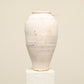 A one-of-a-kind white Turkish vintage vase pot without a handle, crafted from terra cotta clay, this piece showcases timeless quality and antique craftsmanship, adding a unique touch of history to your space