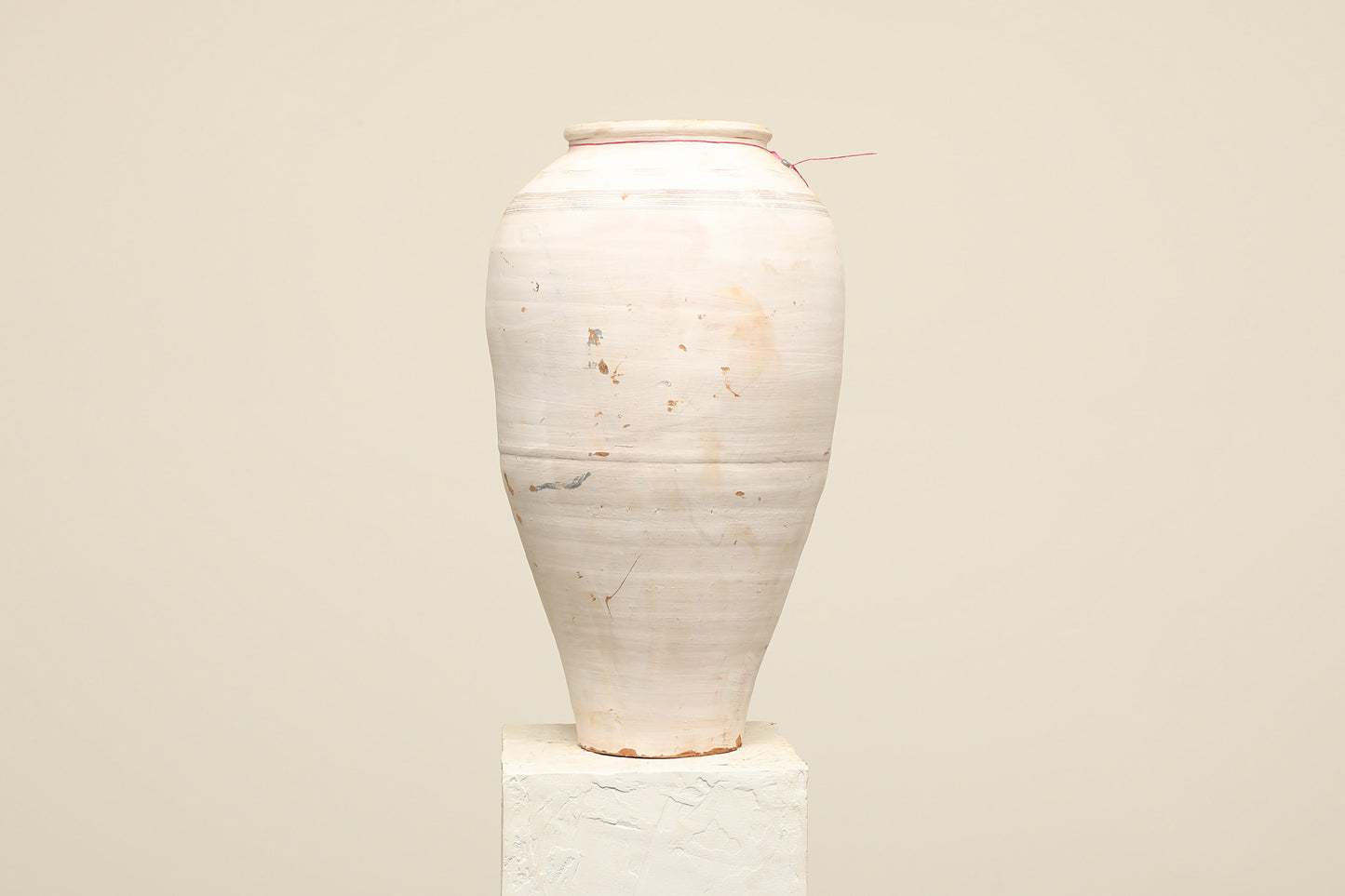 A one-of-a-kind white Turkish vintage vase pot without a handle, crafted from terra cotta clay, this piece showcases timeless quality and antique craftsmanship, adding a unique touch of history to your space