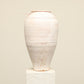 A one-of-a-kind white Turkish vintage vase pot without a handle, crafted from terra cotta clay, this piece showcases timeless quality and antique craftsmanship, adding a unique touch of history to your space