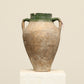 A one-of-a-kind clay brown Turkish vintage vase pot with two handles, crafted from terra cotta clay, this piece showcases timeless quality and antique craftsmanship, adding a unique touch of history to your space
