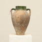 A one-of-a-kind clay brown Turkish vintage vase pot with two handles, crafted from terra cotta clay, this piece showcases timeless quality and antique craftsmanship, adding a unique touch of history to your space
