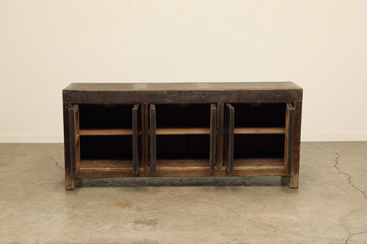 A one-of-a-kind, vintage rustic dark brown sideboard 3 cabinets handcrafted of elm natural wood in a farmhouse style, 76 inches long is narrow at 17 inches.