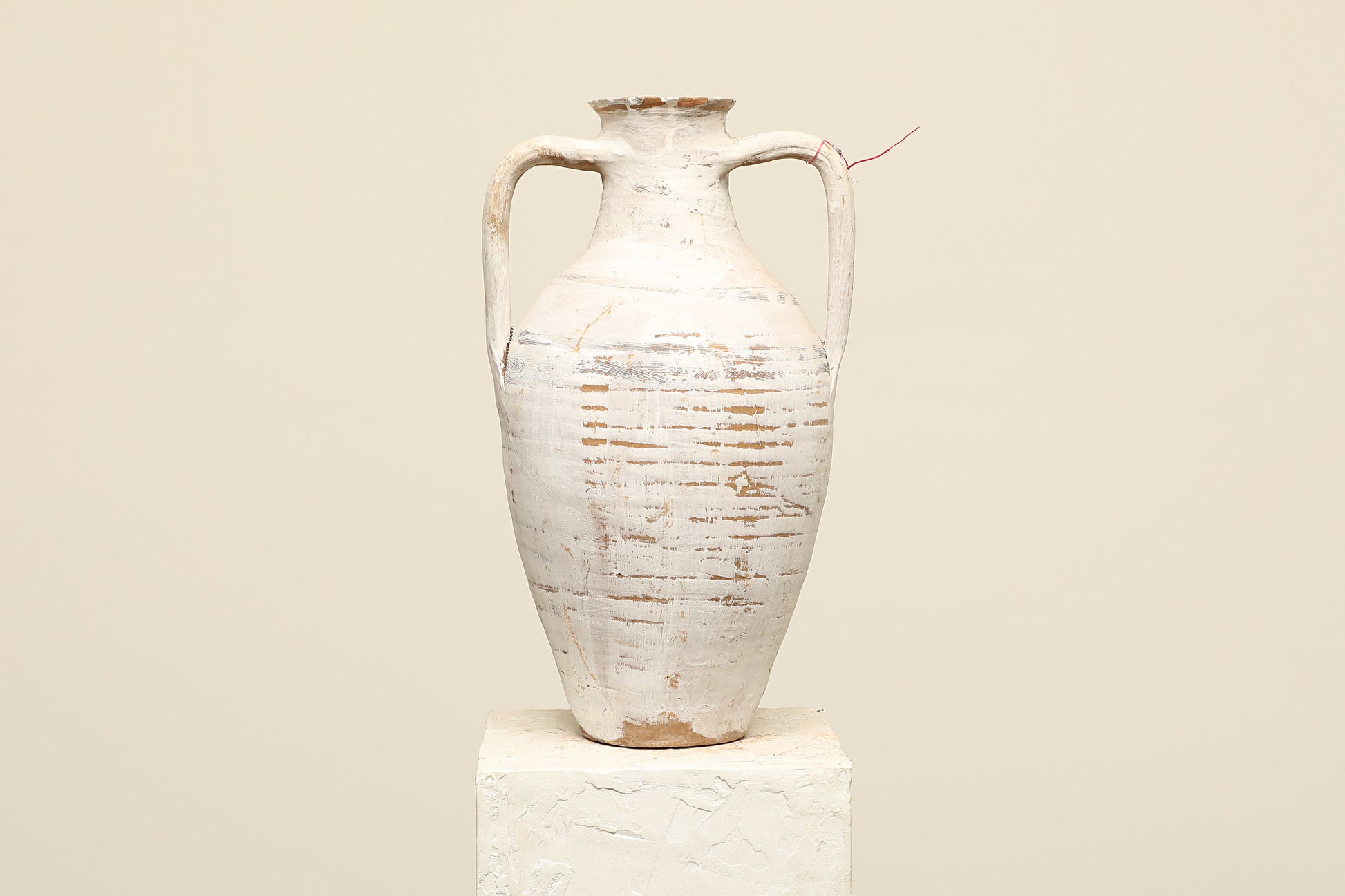 A one-of-a-kind white Turkish vintage vase pot with two handles, crafted from terra cotta clay, this piece showcases timeless quality and antique craftsmanship, adding a unique touch of history to your space