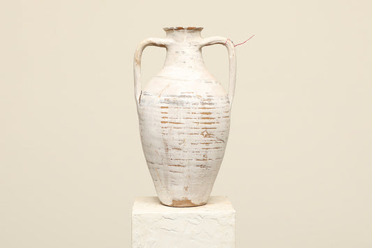 A one-of-a-kind white Turkish vintage vase pot with two handles, crafted from terra cotta clay, this piece showcases timeless quality and antique craftsmanship, adding a unique touch of history to your space