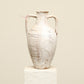A one-of-a-kind white Turkish vintage vase pot with two handles, crafted from terra cotta clay, this piece showcases timeless quality and antique craftsmanship, adding a unique touch of history to your space