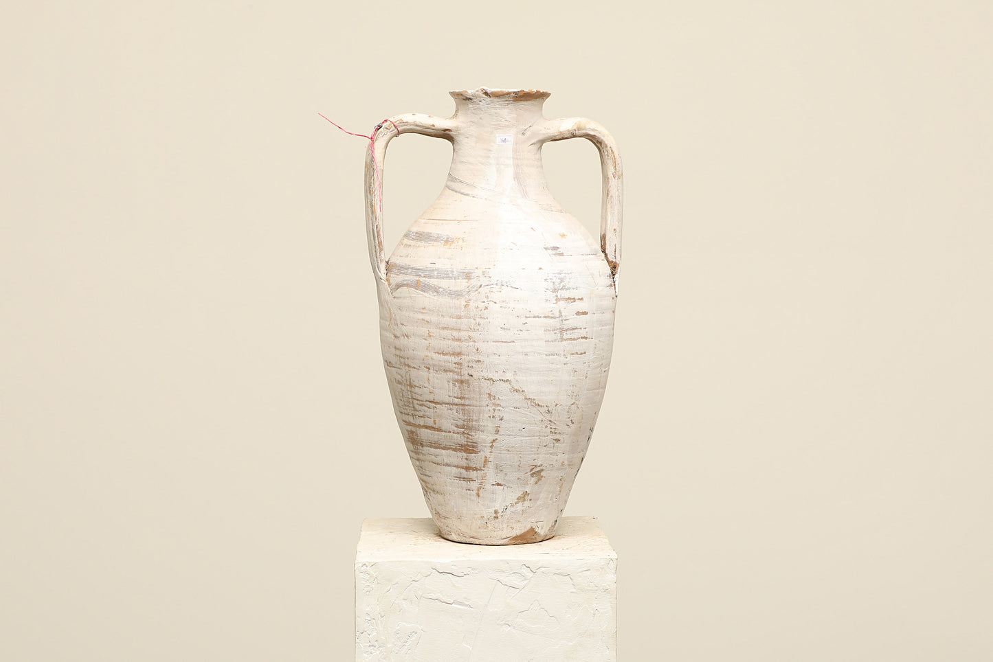 A one-of-a-kind white Turkish vintage vase pot with two handles, crafted from terra cotta clay, this piece showcases timeless quality and antique craftsmanship, adding a unique touch of history to your space