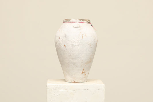 A one-of-a-kind white Turkish vintage vase pot without a handle, crafted from terra cotta clay, this piece showcases timeless quality and antique craftsmanship, adding a unique touch of history to your space