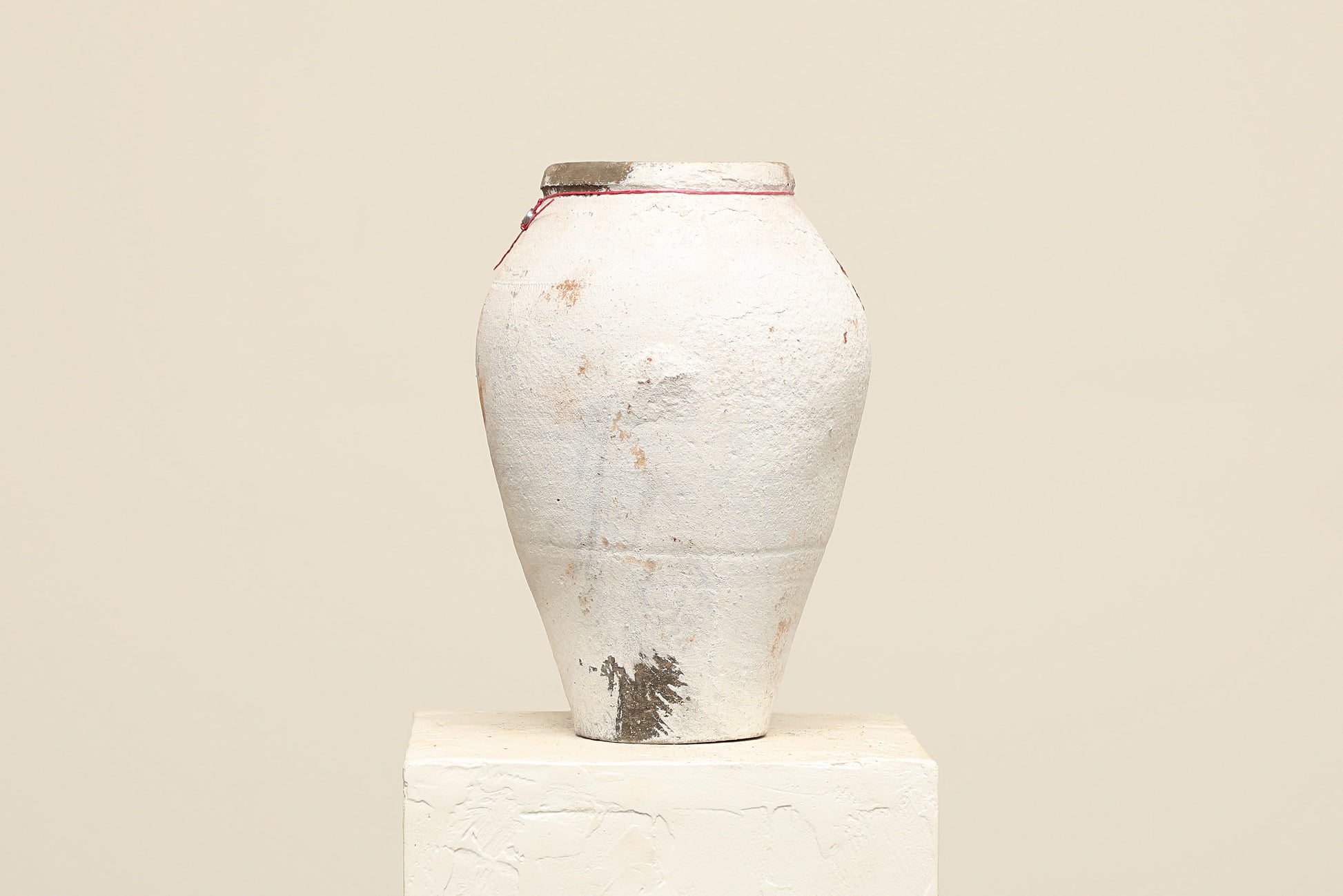 A one-of-a-kind white Turkish vintage vase pot without a handle, crafted from terra cotta clay, this piece showcases timeless quality and antique craftsmanship, adding a unique touch of history to your space