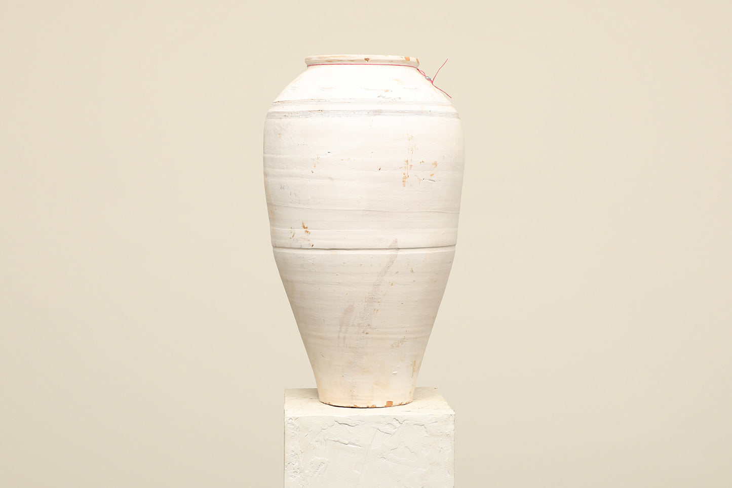 A one-of-a-kind white Turkish vintage vase pot without a handle, crafted from terra cotta clay, this piece showcases timeless quality and antique craftsmanship, adding a unique touch of history to your space