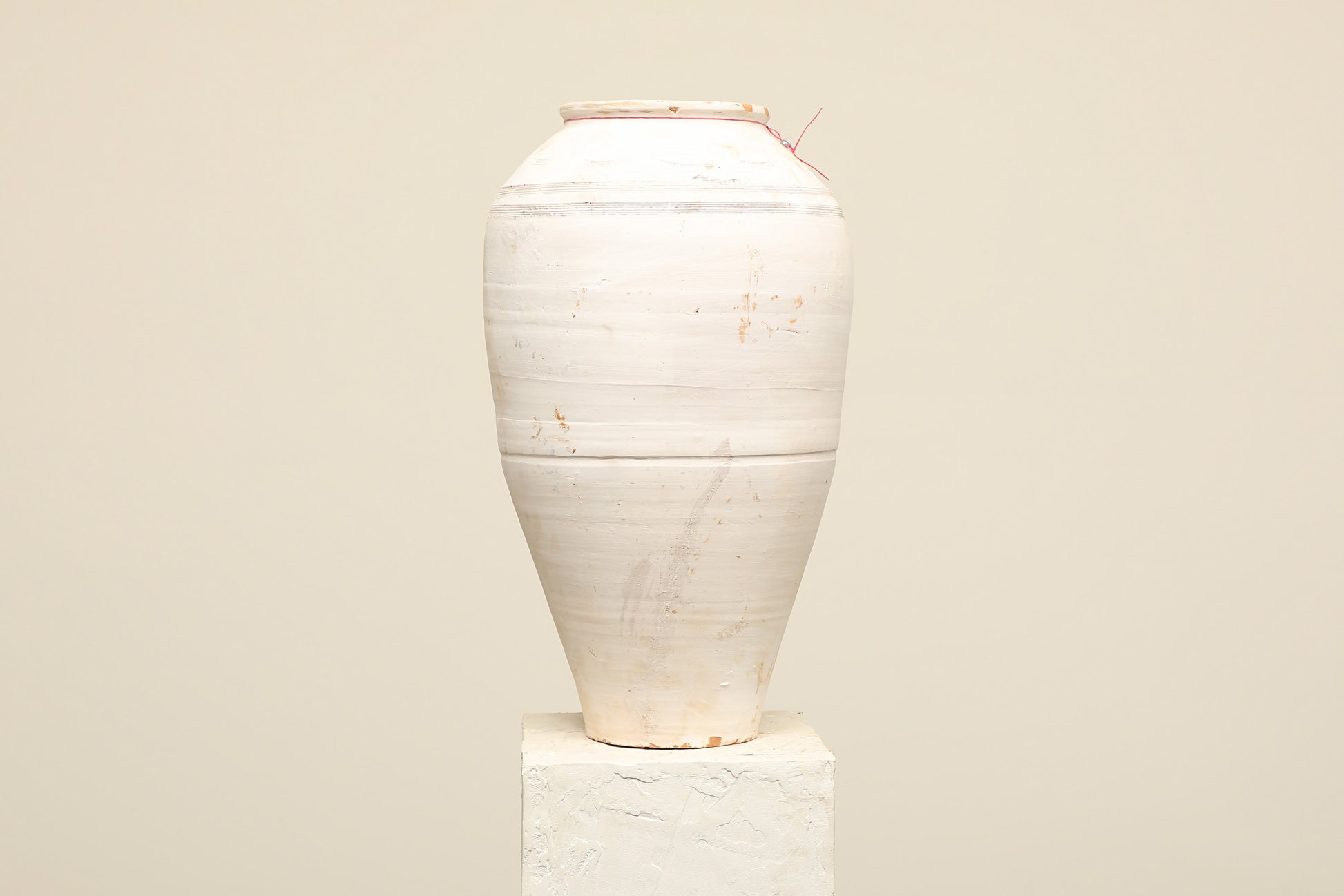 A one-of-a-kind white Turkish vintage vase pot without a handle, crafted from terra cotta clay, this piece showcases timeless quality and antique craftsmanship, adding a unique touch of history to your space