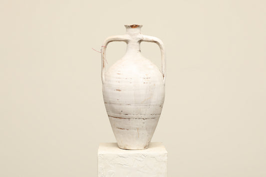 A one-of-a-kind white Turkish vintage vase pot with two handles, crafted from terra cotta clay, this piece showcases timeless quality and antique craftsmanship, adding a unique touch of history to your space