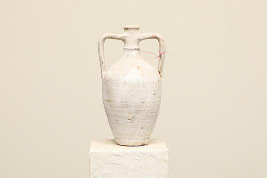 A one-of-a-kind white Turkish vintage vase pot with two handles, crafted from terra cotta clay, this piece showcases timeless quality and antique craftsmanship, adding a unique touch of history to your space