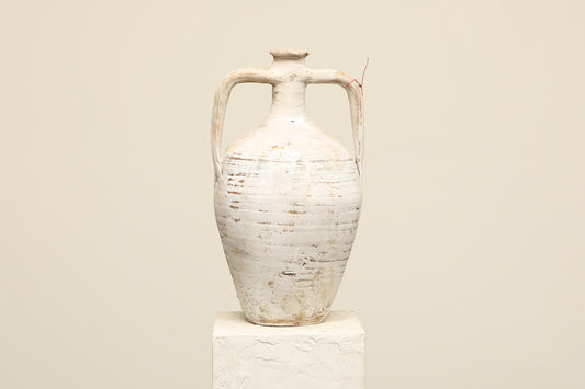 A one-of-a-kind white Turkish vintage vase pot with two handles, crafted from terra cotta clay, this piece showcases timeless quality and antique craftsmanship, adding a unique touch of history to your space