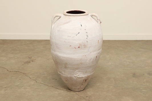 A one-of-a-kind white Turkish vintage vase pot with two handles, crafted from terra cotta clay, this piece showcases timeless quality and antique craftsmanship, adding a unique touch of history to your space