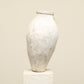 A one-of-a-kind white Turkish vintage vase pot without a handle, crafted from terra cotta clay, this piece showcases timeless quality and antique craftsmanship, adding a unique touch of history to your space