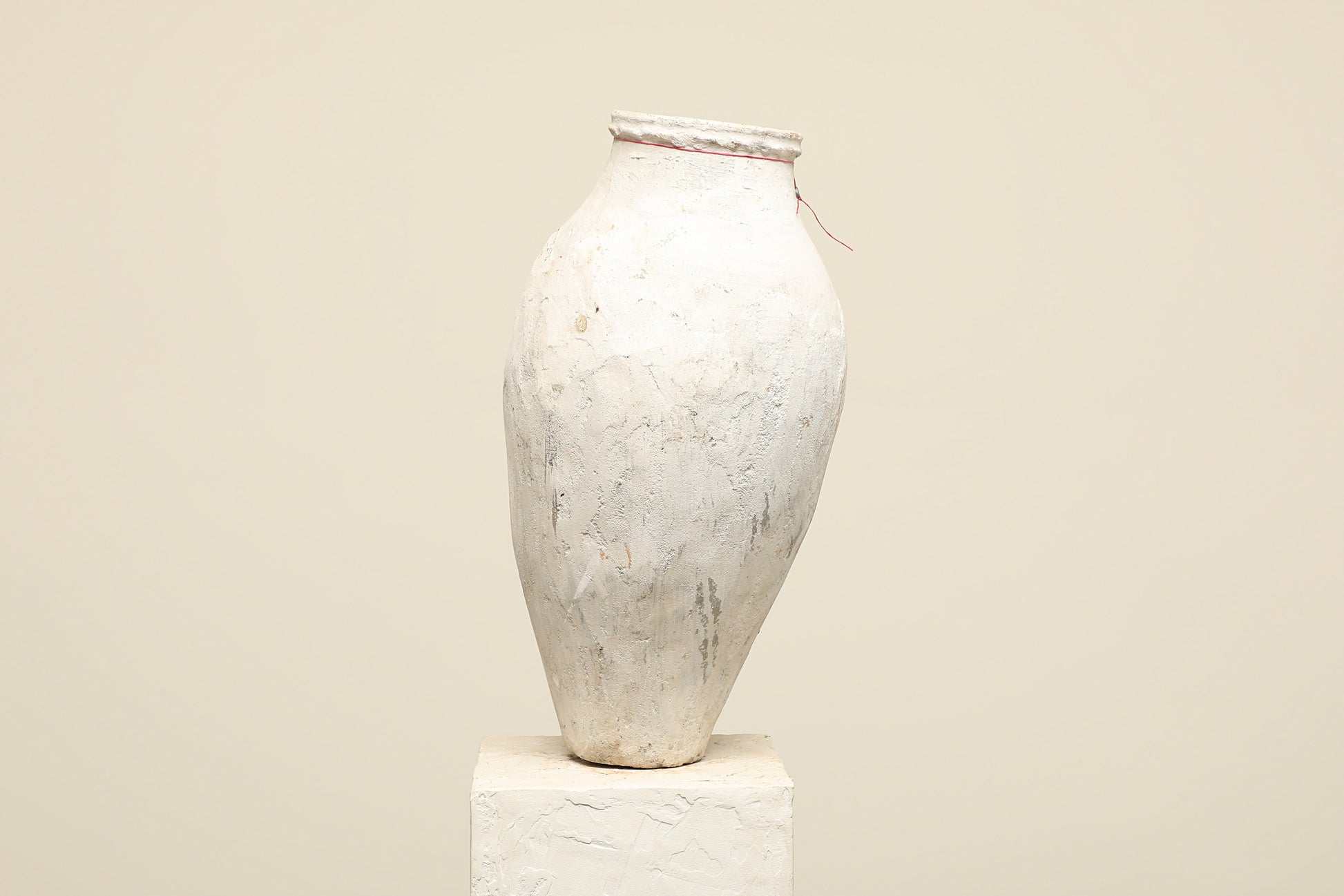 A one-of-a-kind white Turkish vintage vase pot without a handle, crafted from terra cotta clay, this piece showcases timeless quality and antique craftsmanship, adding a unique touch of history to your space