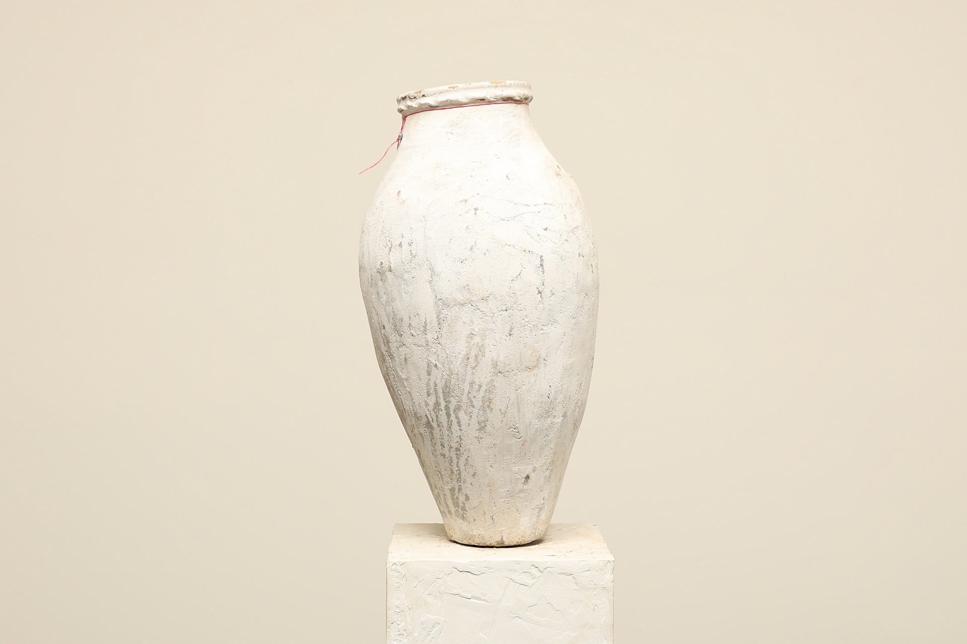 A one-of-a-kind white Turkish vintage vase pot without a handle, crafted from terra cotta clay, this piece showcases timeless quality and antique craftsmanship, adding a unique touch of history to your space