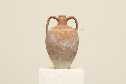 A one-of-a-kind clay brown Turkish vintage vase pot with two handles, crafted from terra cotta clay, this piece showcases timeless quality and antique craftsmanship, adding a unique touch of history to your space