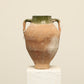 A one-of-a-kind dark brown Turkish vintage vase pot with two handles, crafted from terra cotta clay, this piece showcases timeless quality and antique craftsmanship, adding a unique touch of history to your space