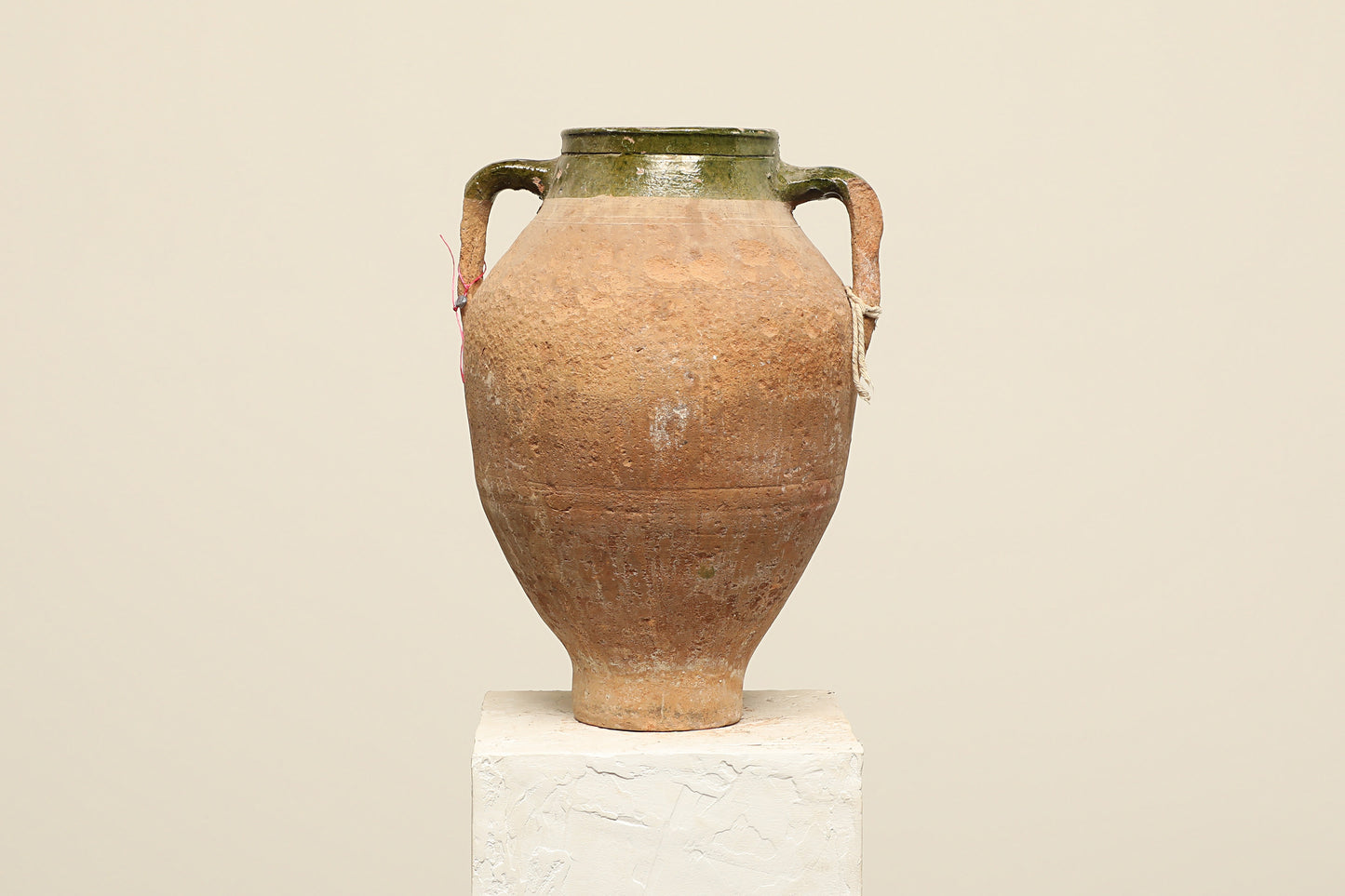 A one-of-a-kind dark brown Turkish vintage vase pot with two handles, crafted from terra cotta clay, this piece showcases timeless quality and antique craftsmanship, adding a unique touch of history to your space