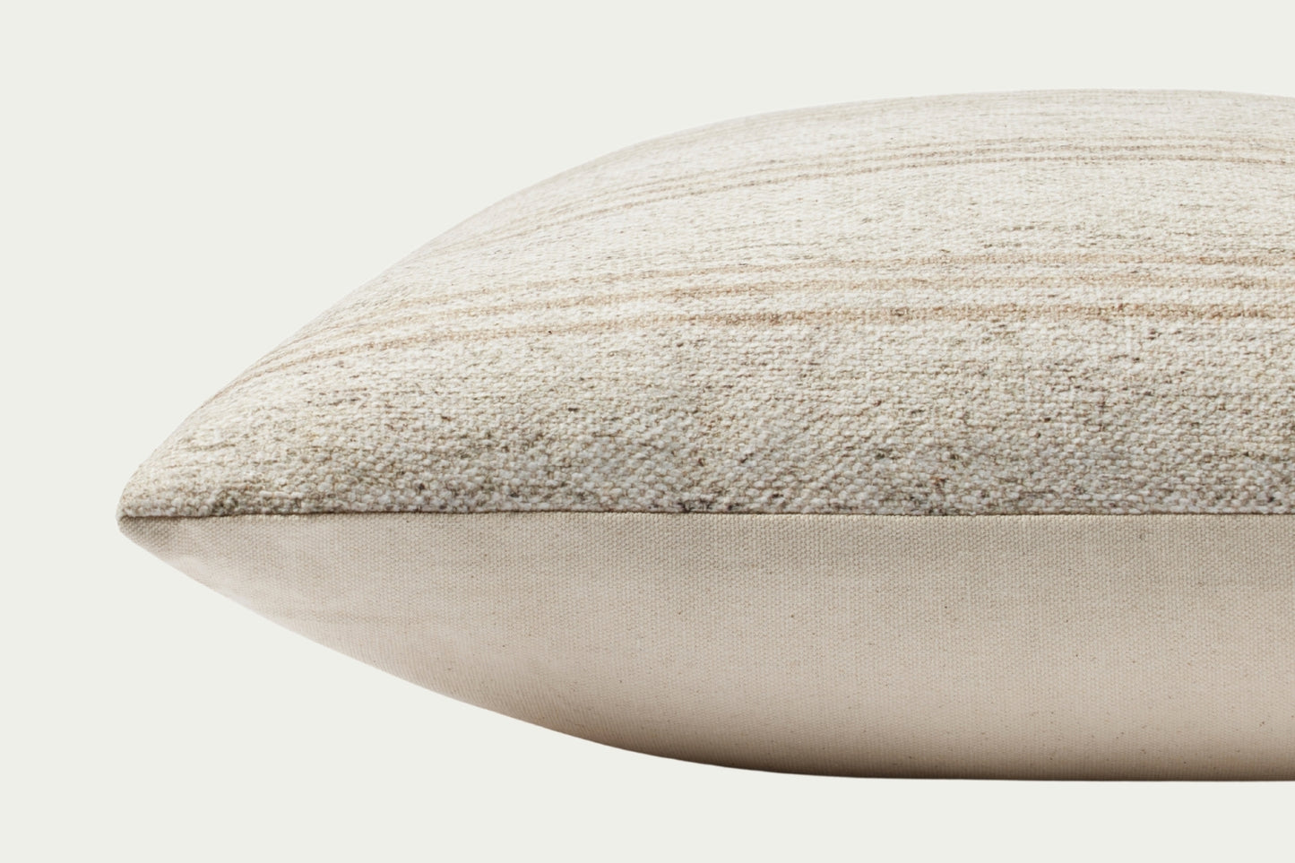 This heathered beige-and-sand striped throw pillow by Amber Lewis x Loloi adds an easygoing yet elevated touch. Measuring 18” square, it's made of a soft polyester-cotton blend.