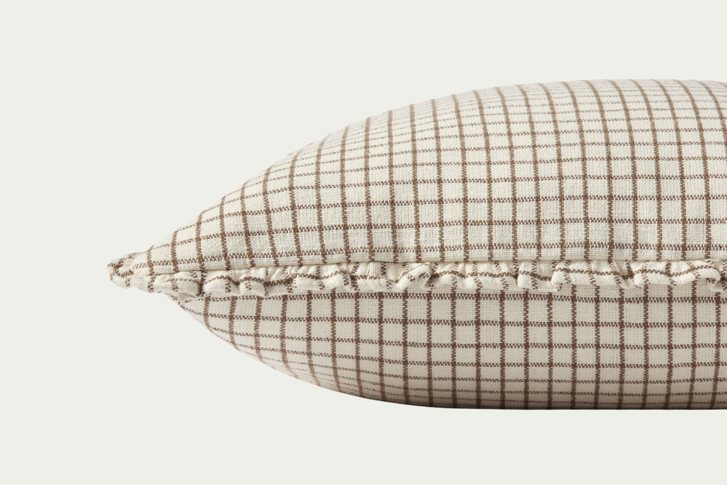 The Kate modern throw pillow in Ivory and Earth adds visual texture and neutral tones. A 22-inch square accent pillow.

The small window pane check and subtle self-ruffle edge work perfectly year-round or for a subtle fall throw pillow.