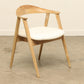 Teak wood Harlow dining chair with a cushioned seat.