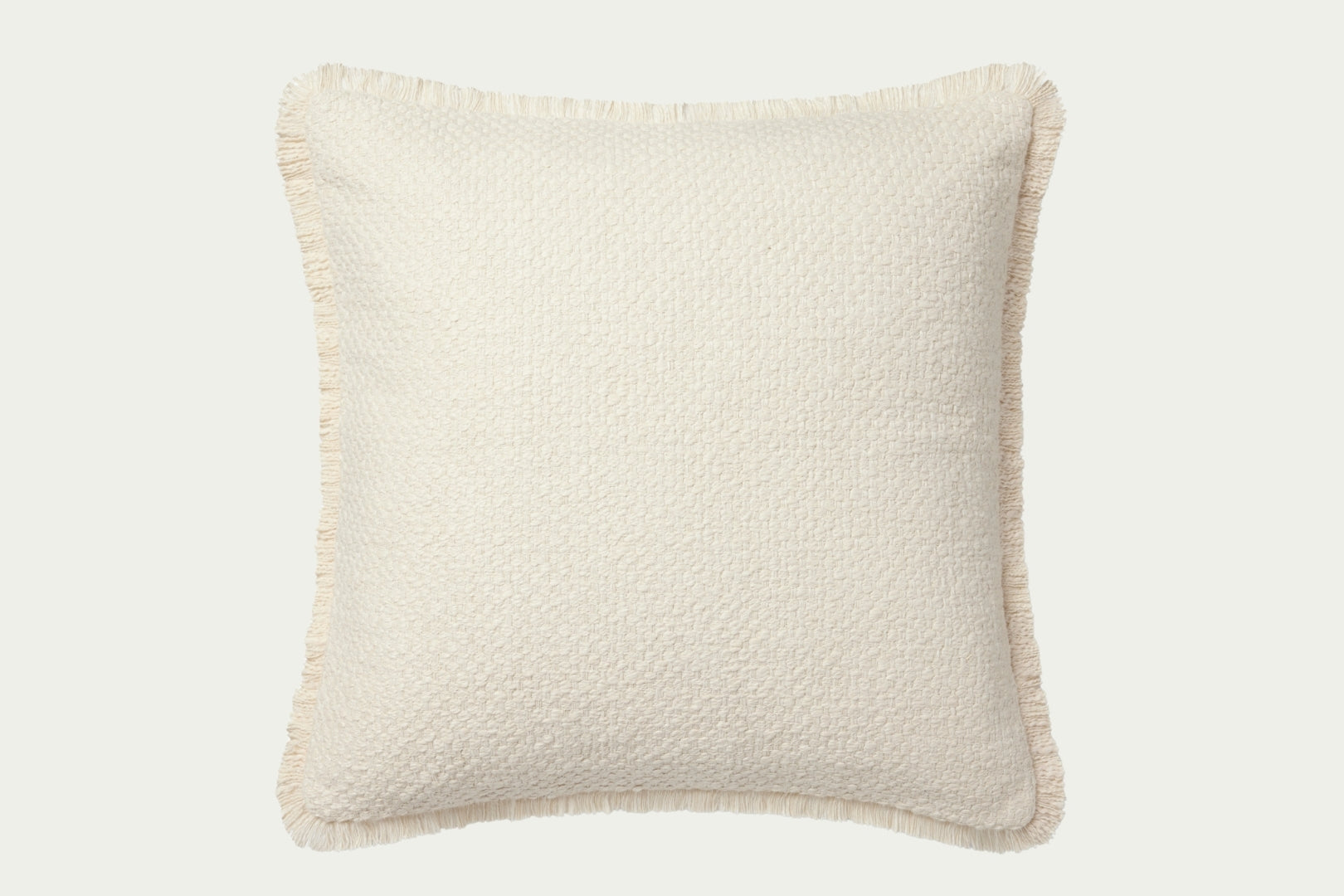 This neutral throw pillow in creamy ivory features soft fringe for added texture. Made of cotton, polyester, and rayon, it measures 22-inch square for easy styling.