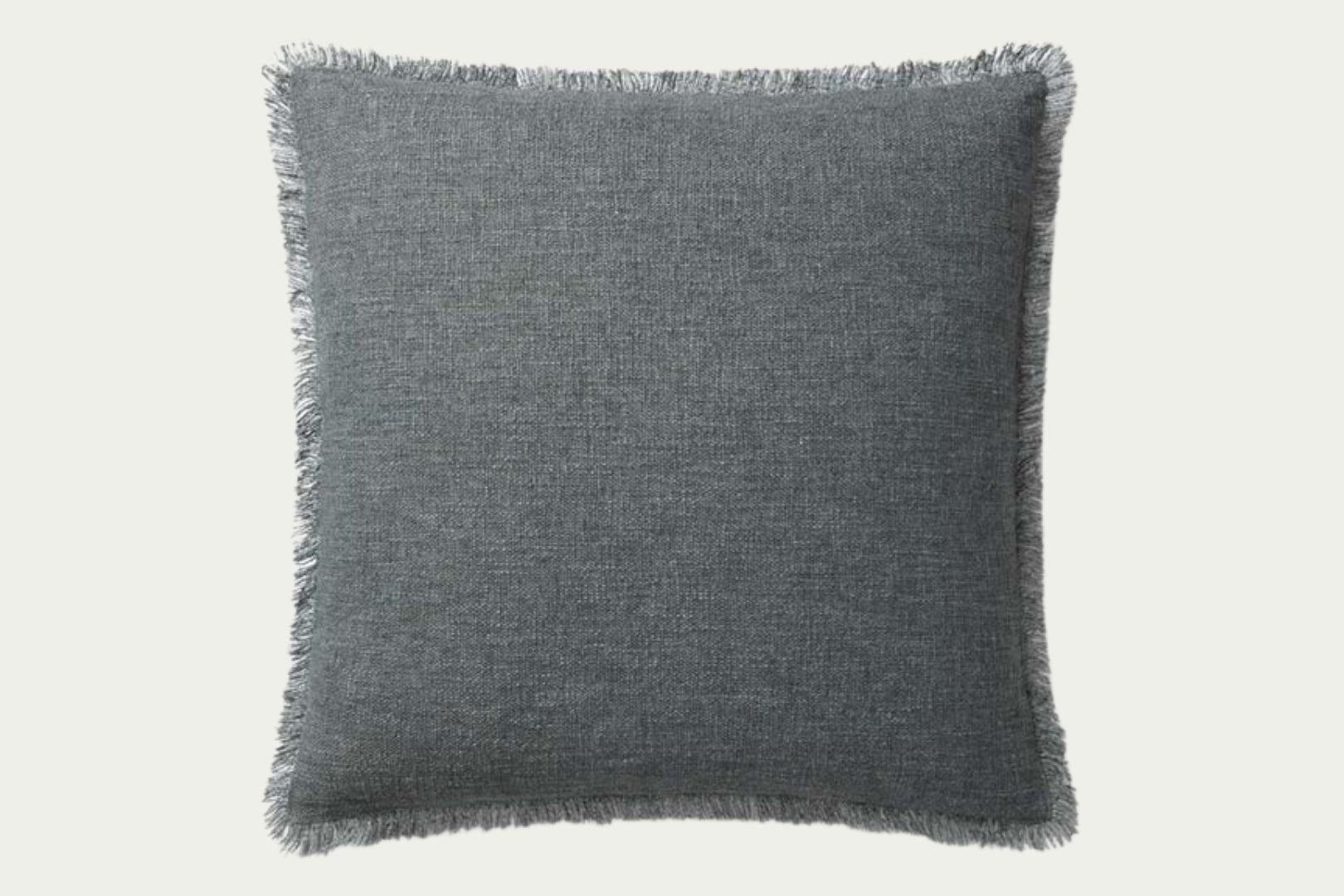 This dusky blue throw pillow by Amber Lewis x Loloi adds subtle color with soft fringe texture. Measuring 22” square, it's made of polyester, cotton, linen, and rayon.