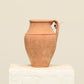 A one-of-a-kind clay brown Turkish vintage vase pot with a handle, crafted from terra cotta clay, this piece showcases timeless quality and antique craftsmanship, adding a unique touch of history to your space