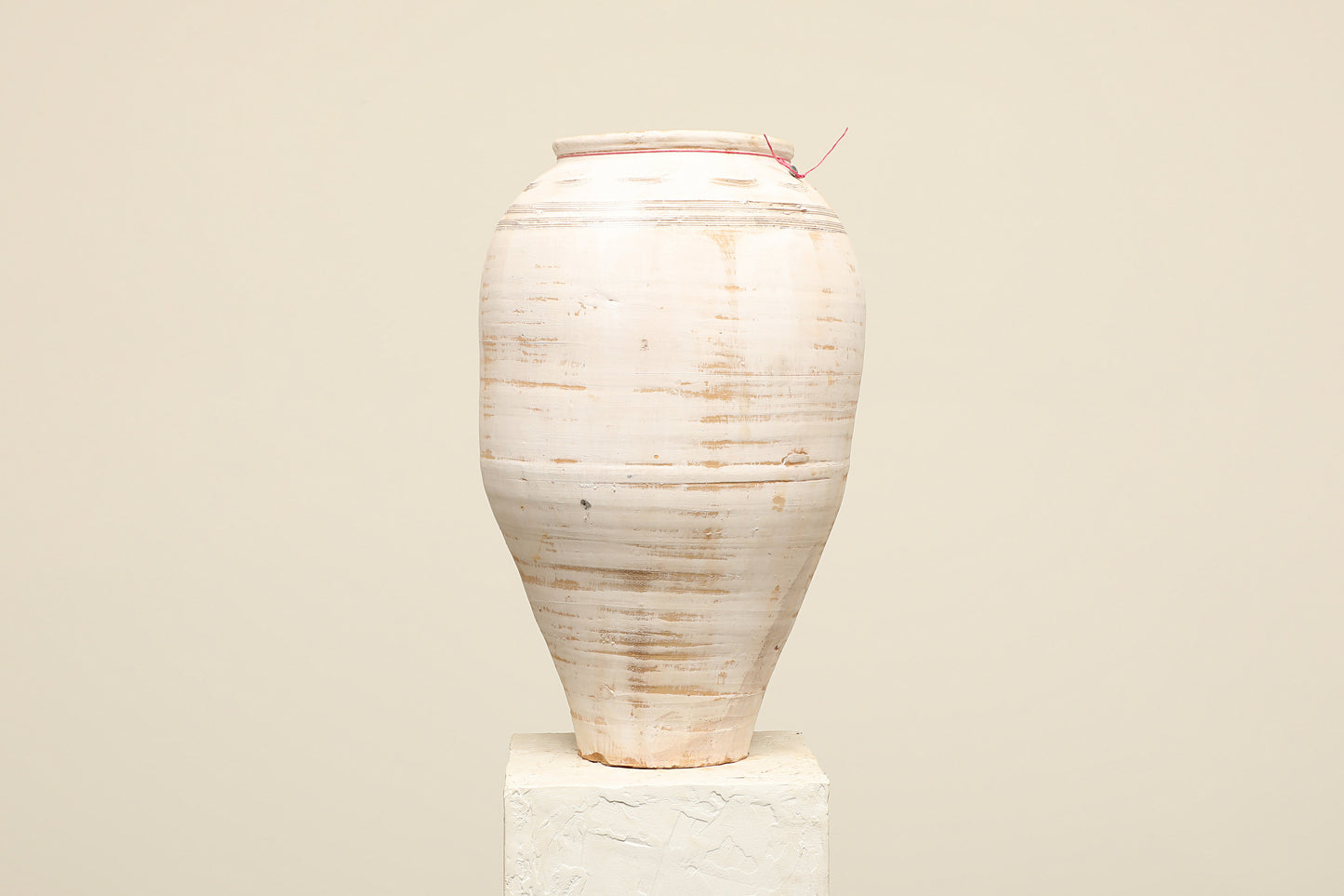 A one-of-a-kind white Turkish vintage vase pot without a handle, crafted from terra cotta clay, this piece showcases timeless quality and antique craftsmanship, adding a unique touch of history to your space