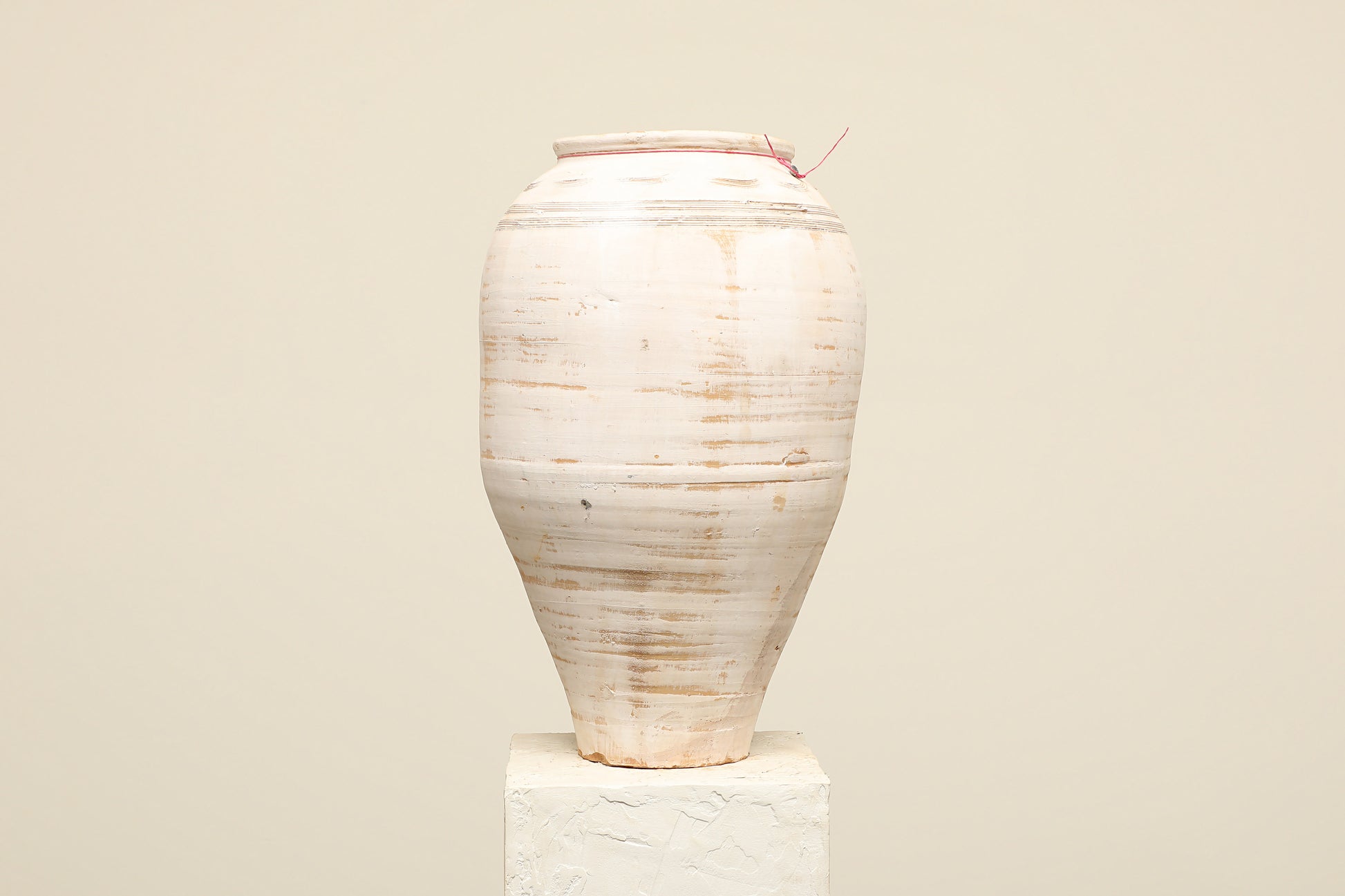 A one-of-a-kind white Turkish vintage vase pot without a handle, crafted from terra cotta clay, this piece showcases timeless quality and antique craftsmanship, adding a unique touch of history to your space