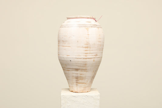 A one-of-a-kind white Turkish vintage vase pot without a handle, crafted from terra cotta clay, this piece showcases timeless quality and antique craftsmanship, adding a unique touch of history to your space