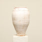 A one-of-a-kind white Turkish vintage vase pot without a handle, crafted from terra cotta clay, this piece showcases timeless quality and antique craftsmanship, adding a unique touch of history to your space
