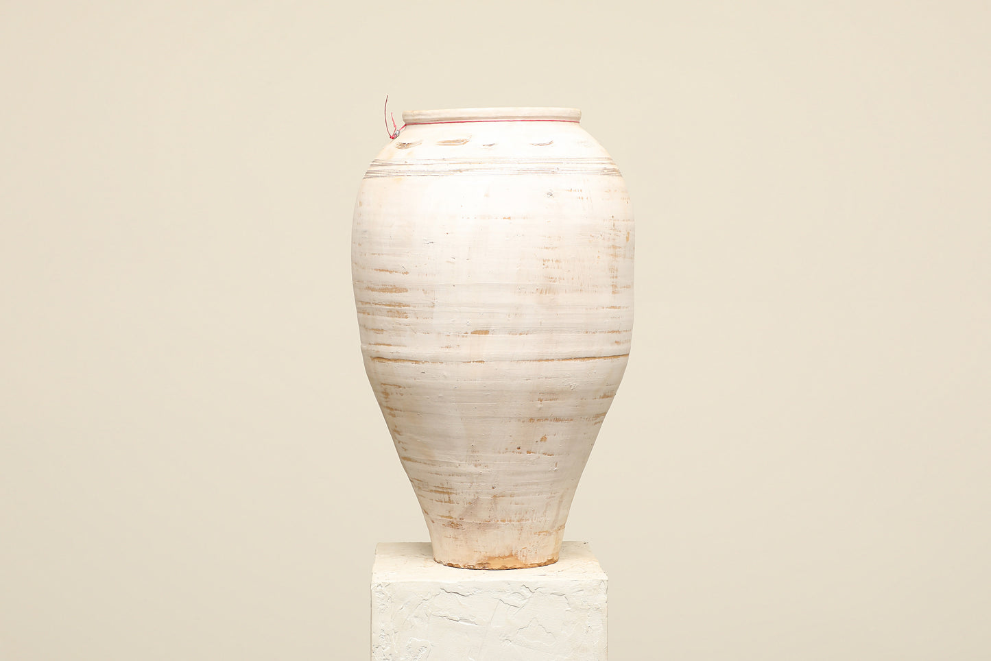 A one-of-a-kind white Turkish vintage vase pot without a handle, crafted from terra cotta clay, this piece showcases timeless quality and antique craftsmanship, adding a unique touch of history to your space