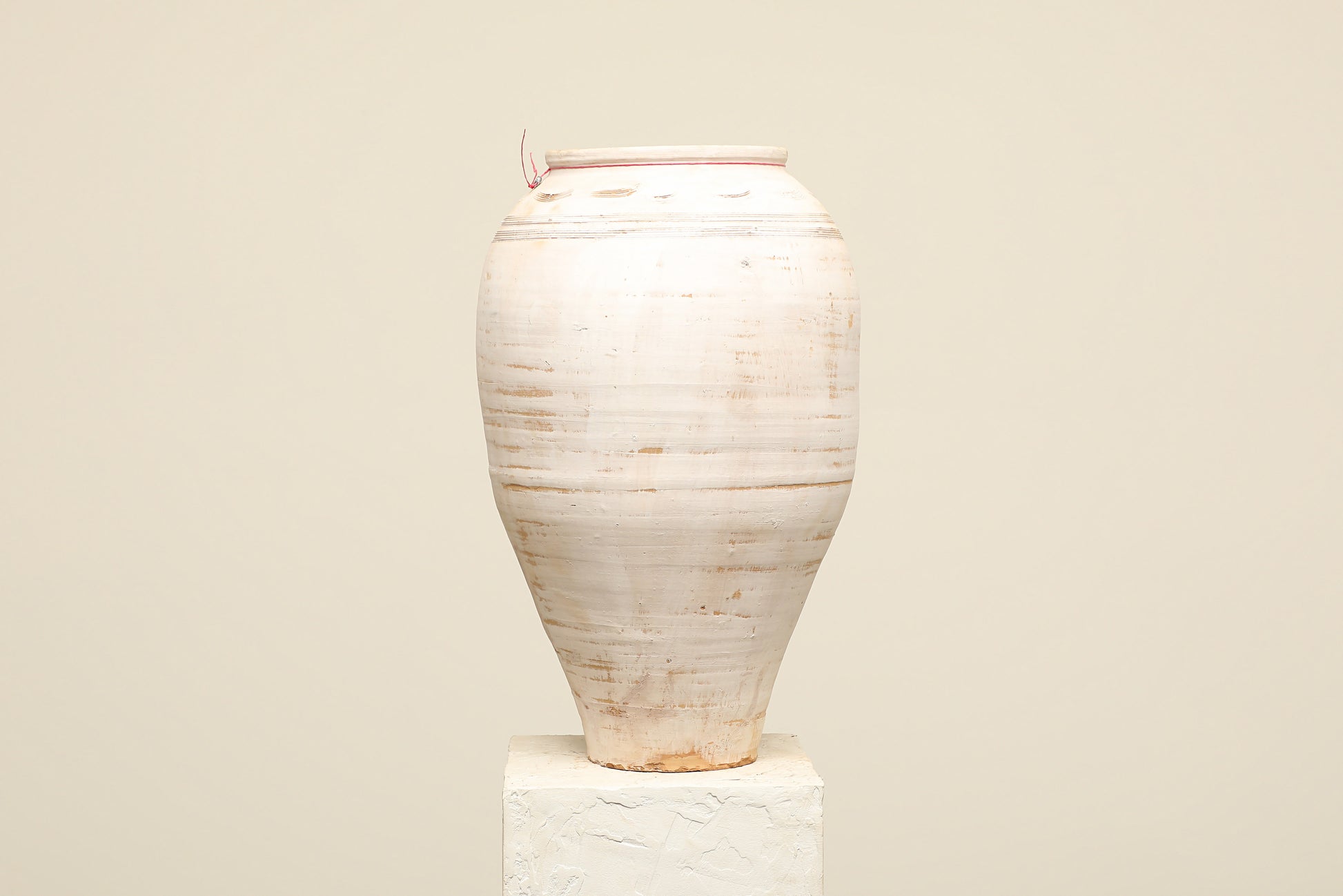 A one-of-a-kind white Turkish vintage vase pot without a handle, crafted from terra cotta clay, this piece showcases timeless quality and antique craftsmanship, adding a unique touch of history to your space