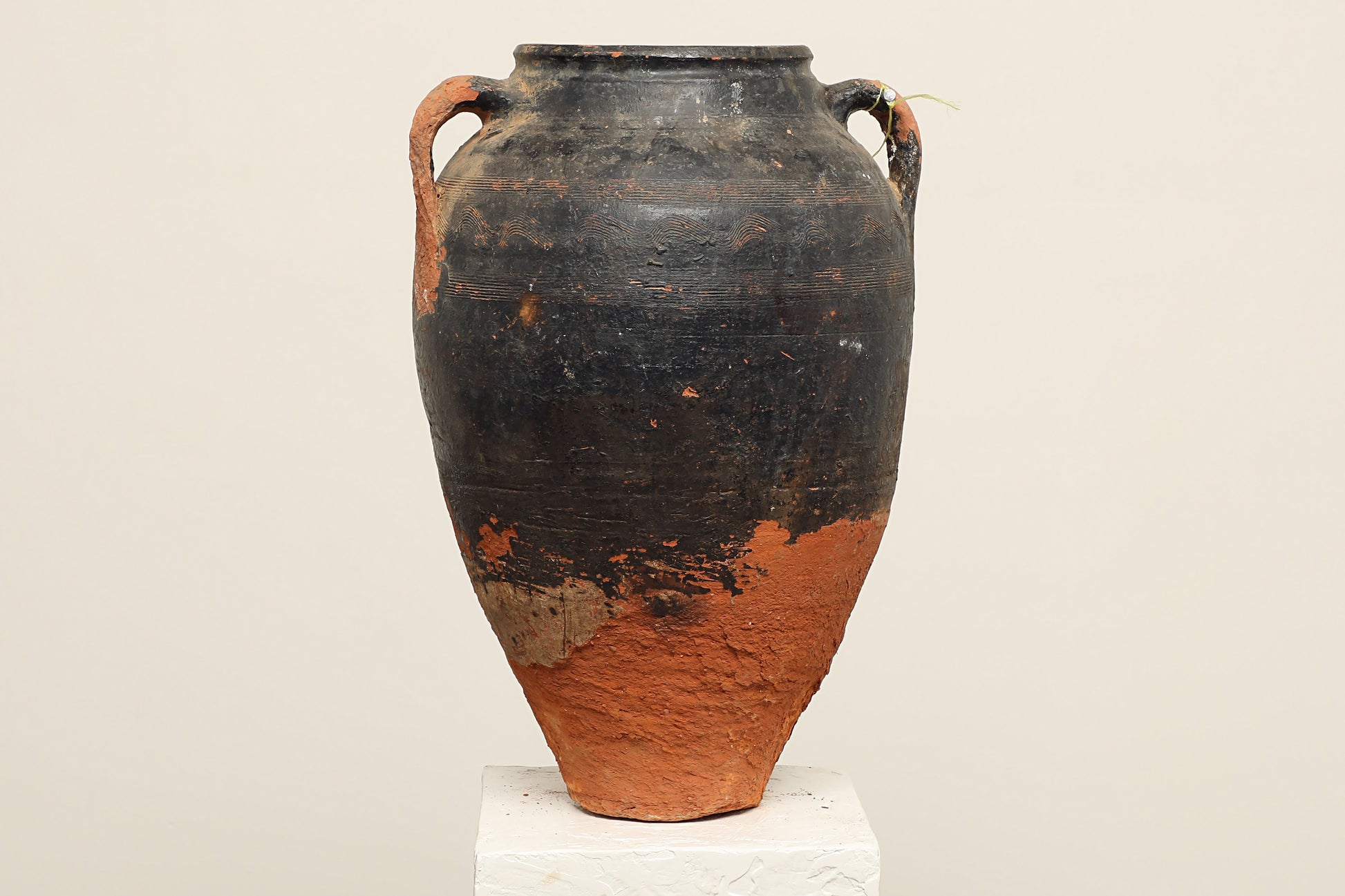 A one-of-a-kind clay brown black Turkish vintage piece with two handle, crafted from reclaimed solid wood, this piece showcases timeless quality and antique craftsmanship, adding a unique touch of history to your space