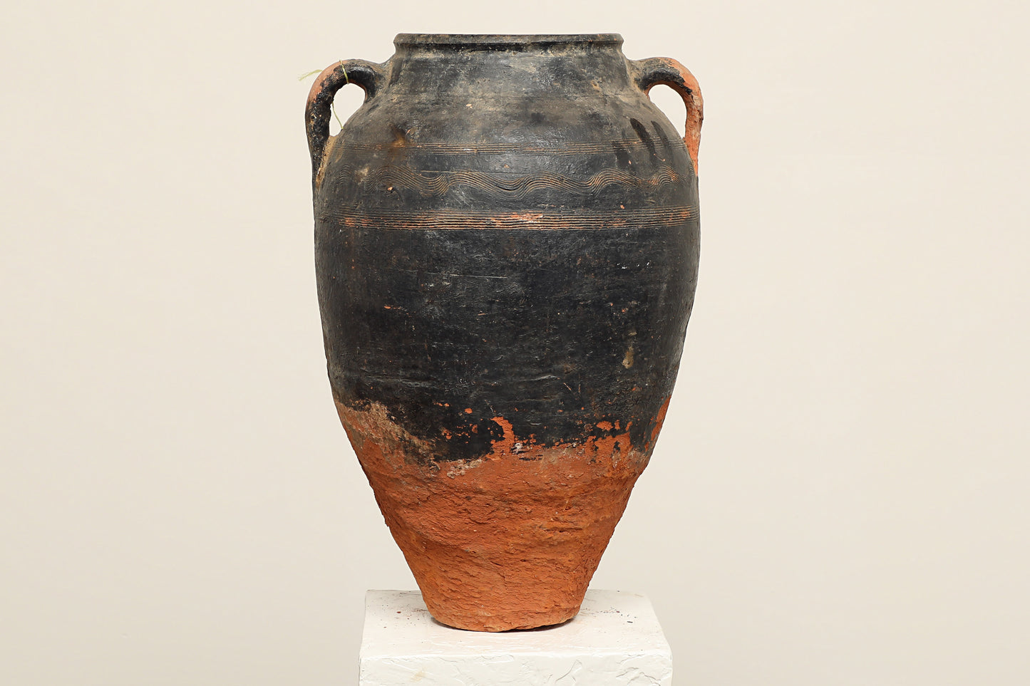 A one-of-a-kind clay brown black Turkish vintage piece with two handle, crafted from reclaimed solid wood, this piece showcases timeless quality and antique craftsmanship, adding a unique touch of history to your space